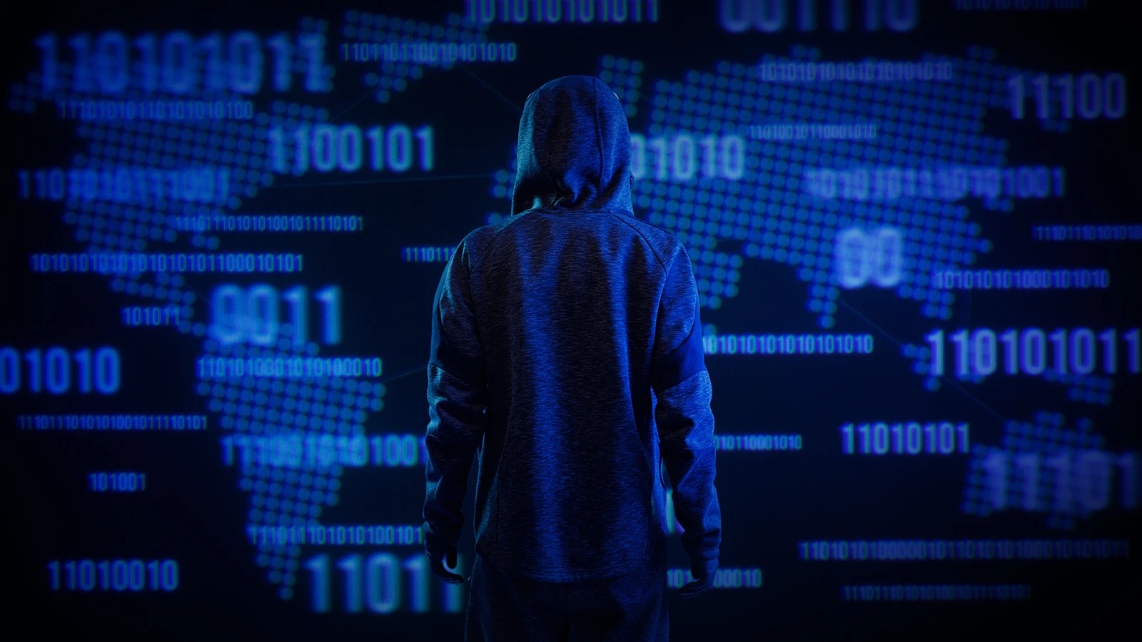 Malicious code imposed on a dark background with a cyber adversary