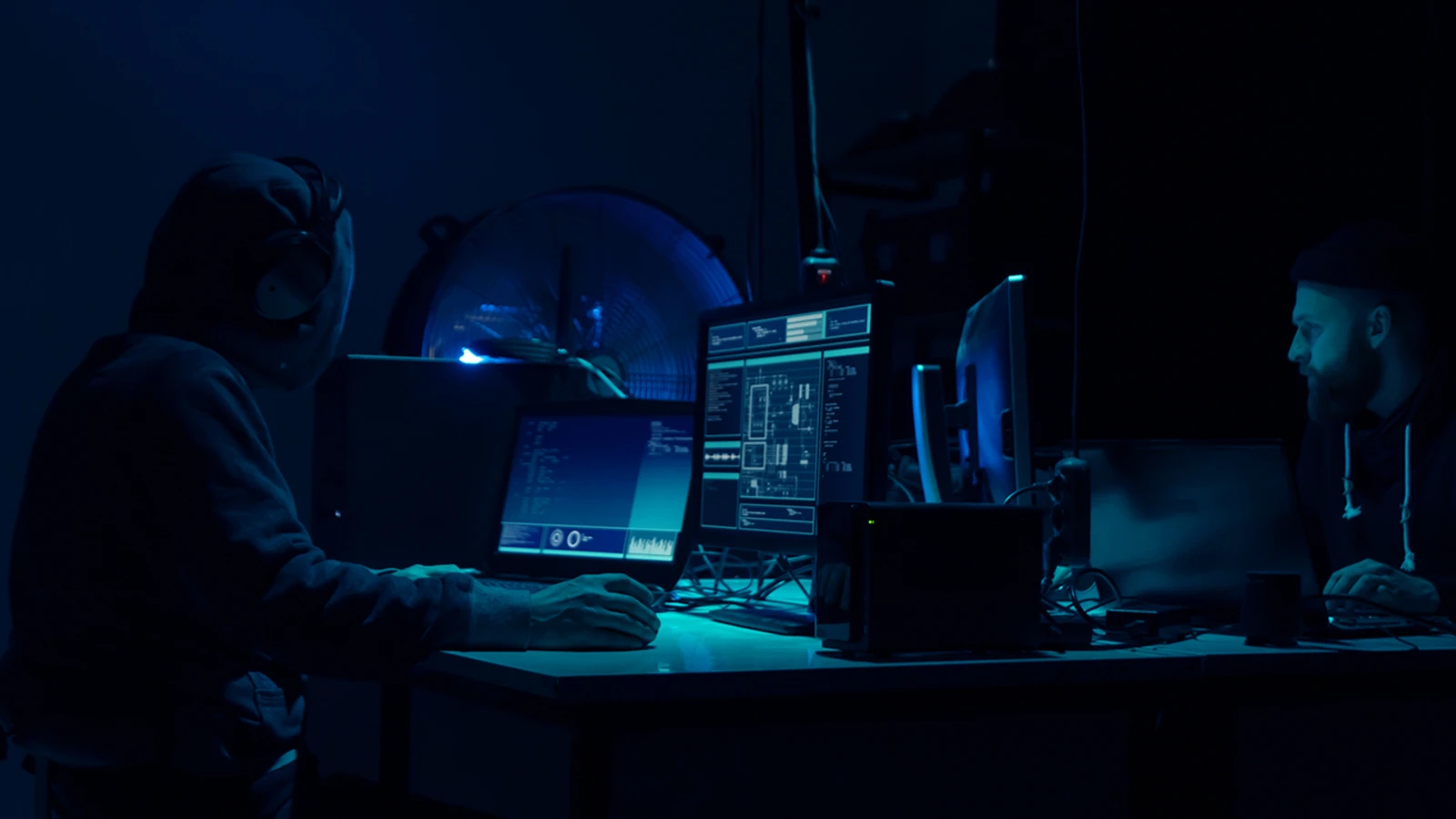 DDoS Attackers in dark room