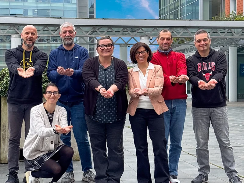 NETSCOUT employees from Modena, Italy holding out their hands for International Women's Day 2026