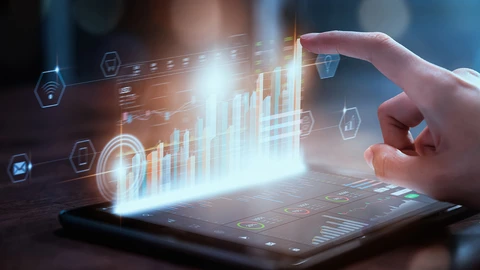 A right hand interacting with a simulated screen over a tablet device