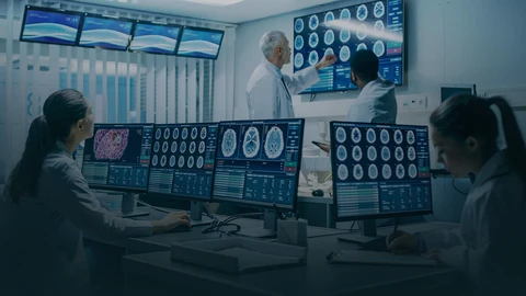 Pharmacist working in a lab with computers
