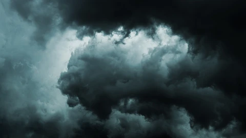 Turbulent grey and black clouds