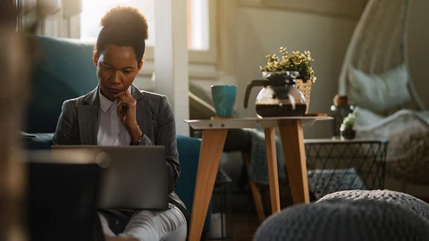 Woman viewing her laptop