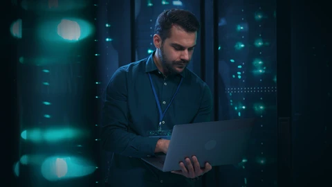 Man holding a laptop