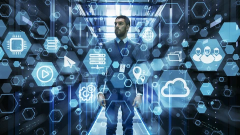 Man in IT Lab Surrounded by Floating Octagon Images