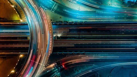 Night time view of multi-highway overpass