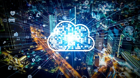 Cloud drawn in middle with cities in background and different type images (auto, laptop, crane, gears) surrounded with lines drawn to them from the cloud.