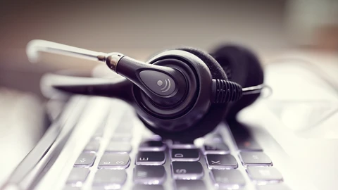 enlarged image of headset on laptop keyboard