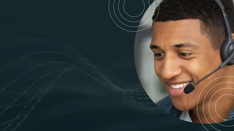 person smiling on a headset