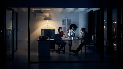 Team working at night on computer