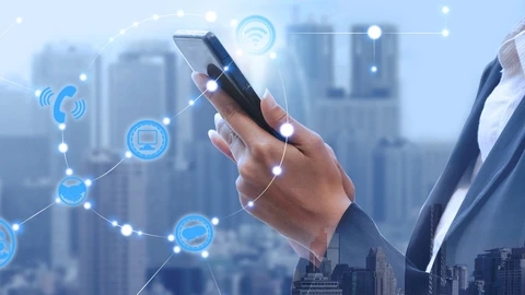 Female hand holding mobile device