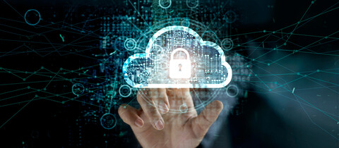 Hand touching lock on cloud to represent cyber resilience 