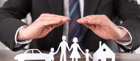 Cutouts of car, people, and home for insurance