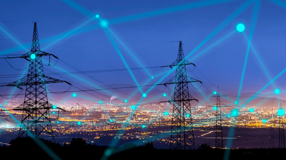 Superimposed network connections in front of power lines with a night sky