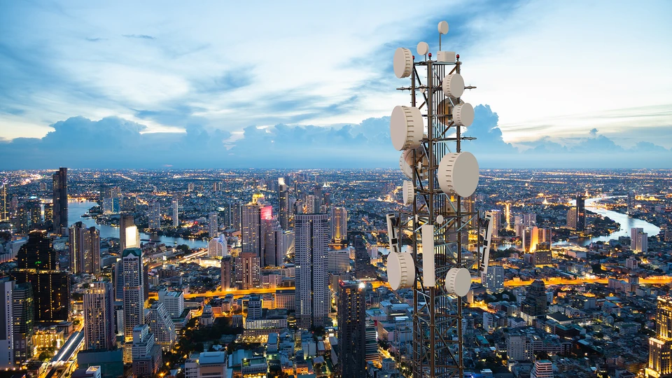Service Provider Tower in Front of Cityscape